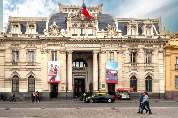 Exterior of and entrance to the Central Post Office in Plaza de Armas, central Santiago, Chile. It was designed by Ricardo Brown, and completed in its current Neoclassical style in 1908. It was designated as a National Monument in 1976.