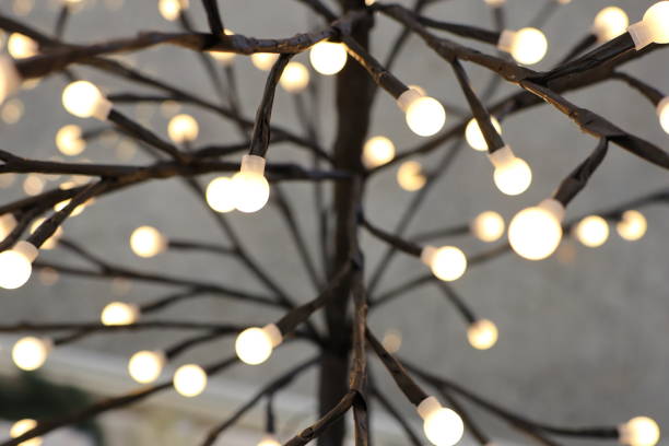 istock Beautifully Illuminated Branches Adorned with Soft, Warm White Lights for a Magical Touch 2183331425