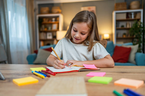 istock Cute girl studying for exam 2183335051