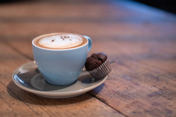 istock A steaming cup of coffee, with frothy milk foam 2183343158