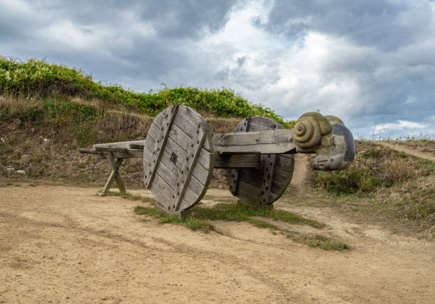 Plevenon, France - July 20, 2024: Medieval wooden chariot ram for ramming enemies or obstacles in the war