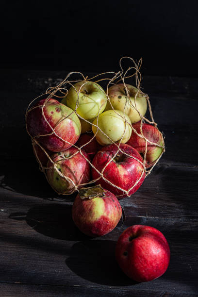 istock Rope bag with organic apples 2183349456