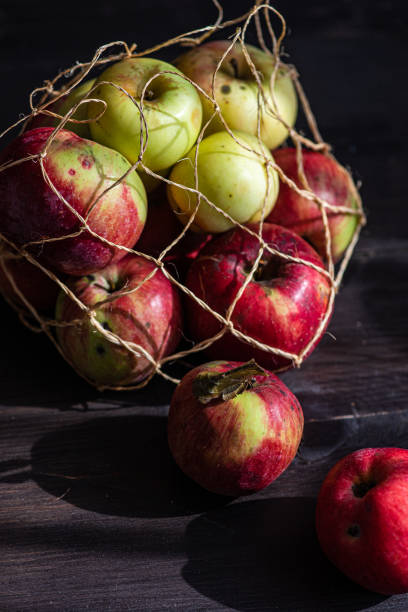 istock Rope bag with organic apples 2183349460