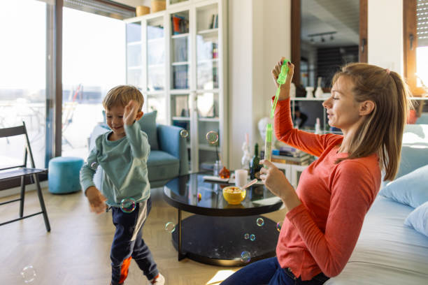 istock Mom and son playing together 2183350071