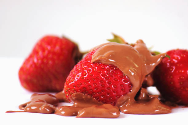 Closeup Satisfy your sweet tooth with this image of rich, decadent chocolate meeting juicy strawberries. 3D render.