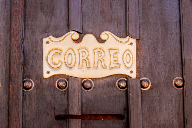 istock Door of an old post office in the foreground. 2183362892