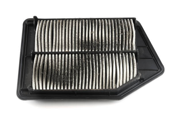 Car air filter in car service. Automotive industry concept background.