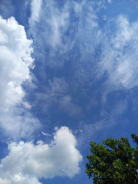 istock a backdrop of a blue sky with bright clouds 2183369307