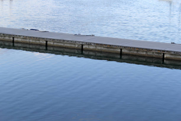 Part of a dock and pilings used for securing recreational boats near the shoreline of Chincoteague Island, Virignia.