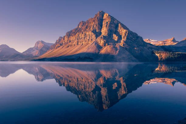 istock Calm Bow Lake water in morning sun 2183387239