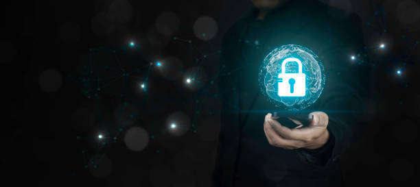 istock Cyber security systems concept. Businessman protecting personal data on smart phone with virtual screen interfaces. 2183393619