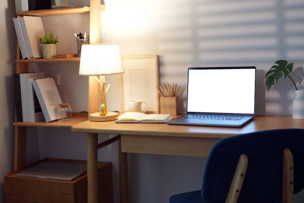 istock Cozy Home Office with Laptop, mockup blank screen. 2183393956