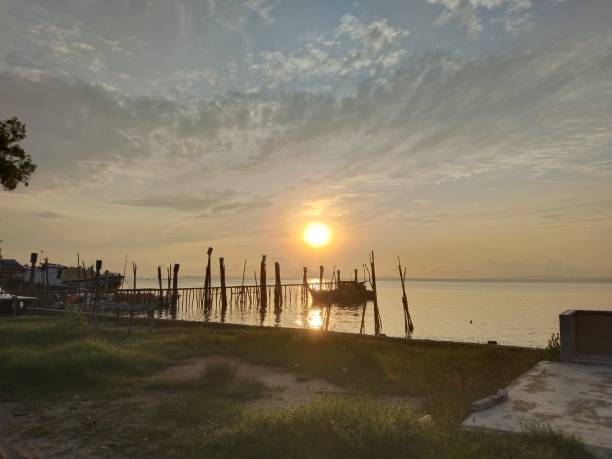 istock The sunrise on the beach is very beautiful 2183396399