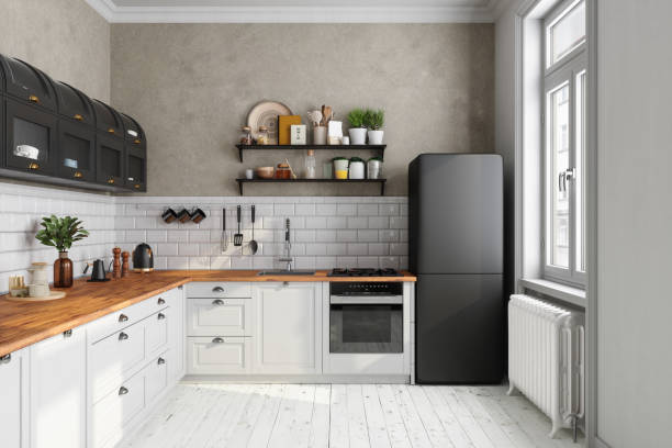 istock Classic Kitchen Interior With Black And White Cabinets, Brick Wall, Black Refrigerator And Kitchen Utensils 2183408138