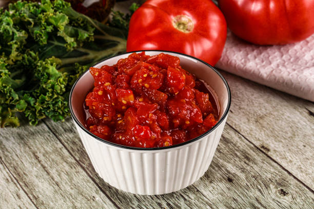 istock Diced ripe tomato with sauce 2183409504