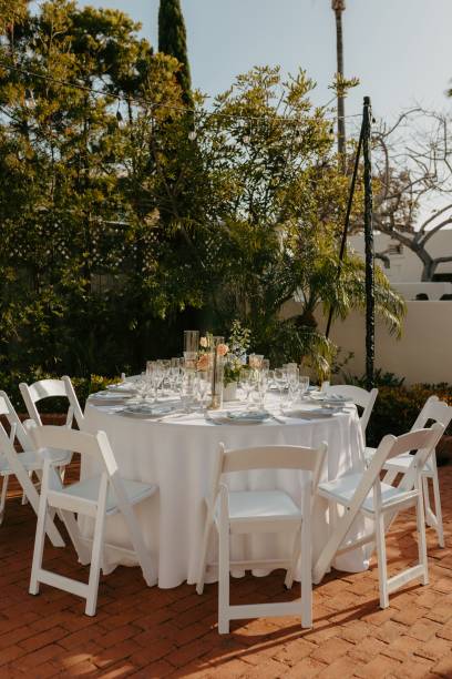 istock Elegant wedding table setting with flowers and glasses, perfect for a romantic celebration 2183409544