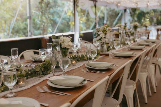 istock Elegant wedding table setting with flowers and glasses, perfect for a romantic celebration 2183409550