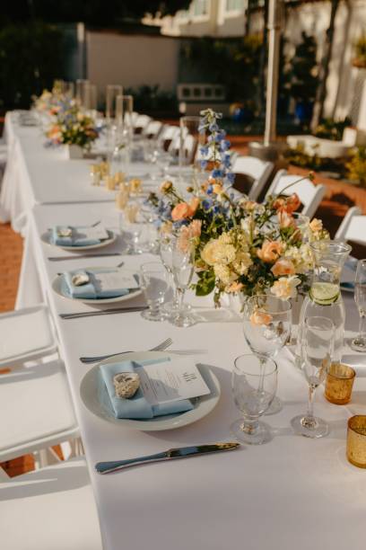 istock Elegant wedding table setting with flowers and glasses, perfect for a romantic celebration 2183409577