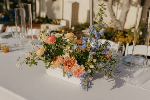 istock Elegant wedding table setting with flowers and glasses, perfect for a romantic celebration 2183409585