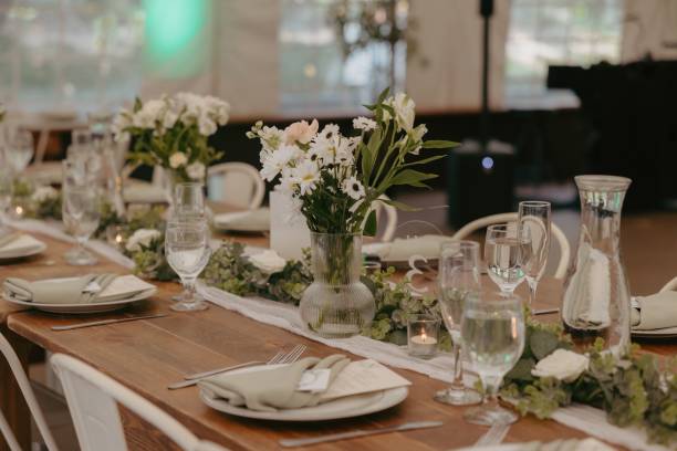 istock Elegant wedding table setting with flowers and glasses, perfect for a romantic celebration 2183409589
