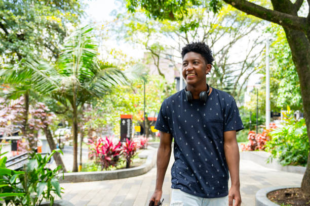 istock Young man sightseeing in Parque Lleras in El Poblado, Medellin, Colombia 2183409742