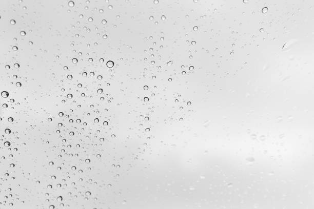 istock Water drops background, backdrop glass covered with drops of water. bubbles in water 2183412906