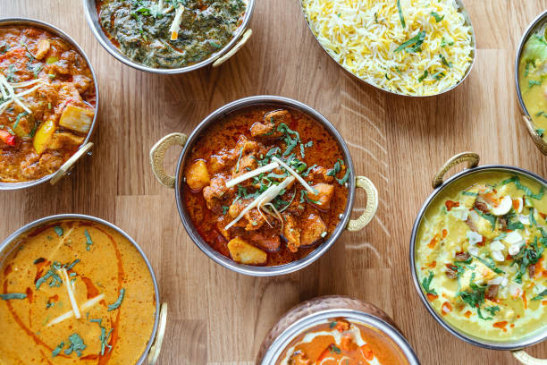 Different indian food on wooden background