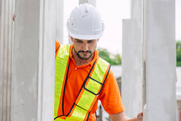istock Professional engineer Hispanic Latin male working in concrete precast plant factory control operate construction site. 2183415230
