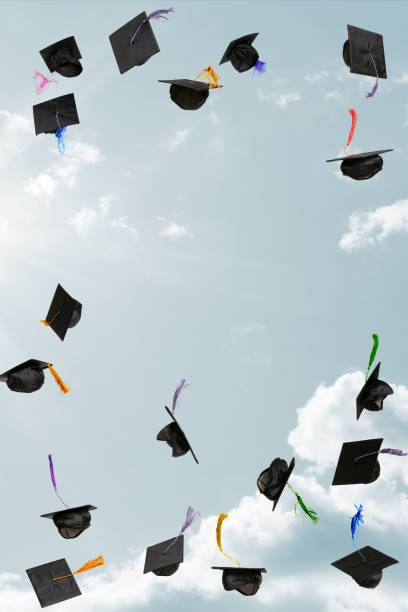 istock Graduation caps thrown in the sky 2183418850