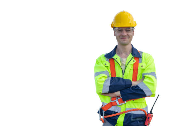 istock Young Caucasian smart engineer worker male standing confident arm crossed looking camera smiling dressing safety reflection suit isolated on white background. 2183419637