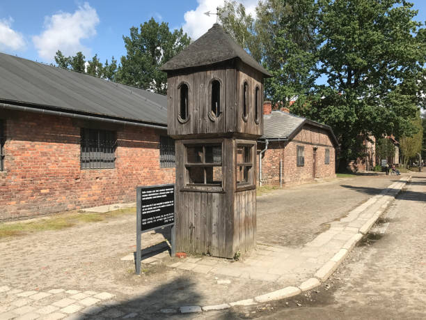 Auschwitz Birkenau Concentration Camp watch tower with barbed wire fences