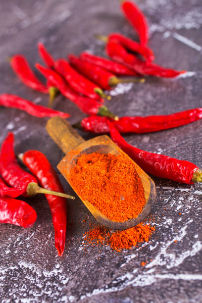 istock Red dried pepper on a dark stone background. 2183426827