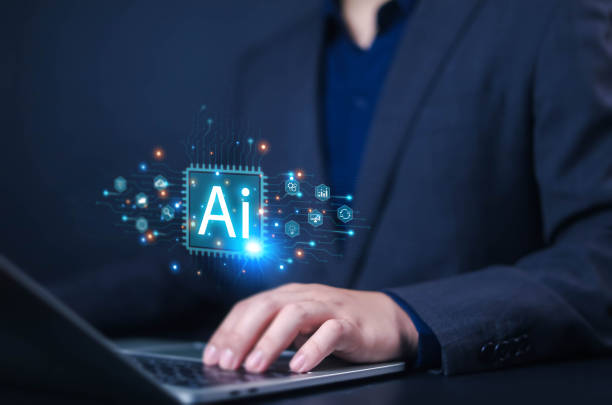 istock Businessman using laptops with technology AI, AI icon displayed on businessman's screen, Ai technology, Artificial Intelligence helps laptop or smartphone users work or search better. 2183428389