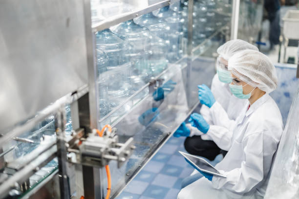 istock Worker people working in Drinking water factory, Hygiene uniform cleanliness workplace with clean care. 2183428938