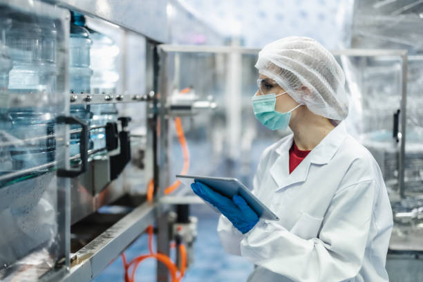 istock Worker people working in Drinking water factory, Hygiene uniform cleanliness workplace with clean care. 2183428970