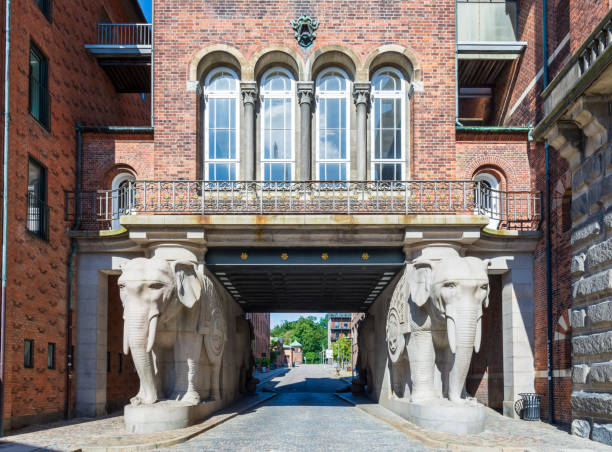 Copenhagen, Denmark - July 18, 2024: East side of the Elephant Gate completed in 1901 in the former Carlsberg brewery site, taking its name from four large elephant statues which flank the gate.