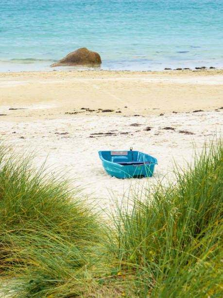 istock Blue Boat on Sandy Beach with Ocean View in Pontusval 2183434147