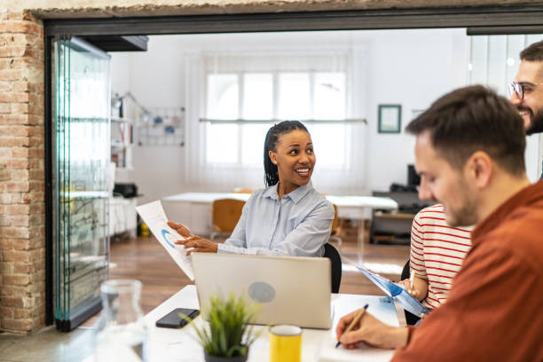 istock Business people sharing ideas in a meeting at the office 2183436965