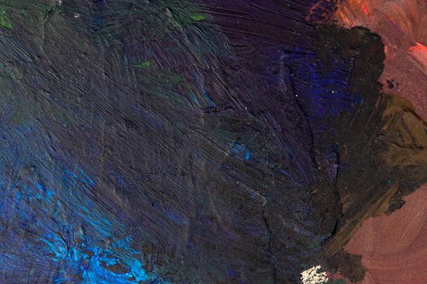 istock painted with blue and green paint palette for mixing paints 2183444078