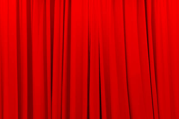 istock red theater curtain that dropped down as a straight line. Background for inserting text, empty spaces 2183447080