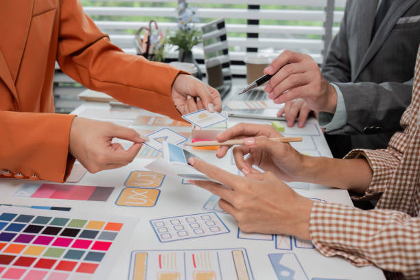 istock Creative Team of Graphic Designers Collaborating on Innovative Projects in a Modern Office Environment 2183447874