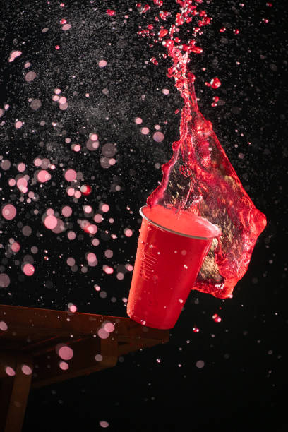 istock A red plastic cup splashes with vibrant red liquid in a dramatic freeze-frame shot, capturing the lively essence of Beer Fest celebrations. The liquid forms dynamic patterns against a dark backdrop 2183451425