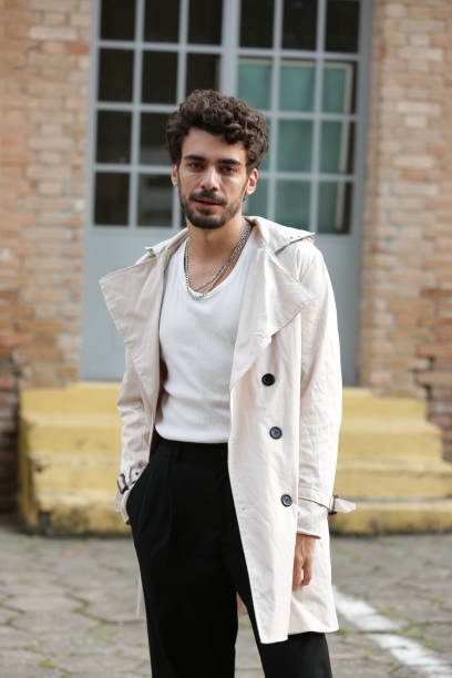 istock Transforming Male Photographic Model Styles into Dynamic Poses and Trend-Setting Outfits. 2183454058