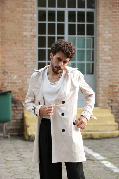 istock Transforming Male Photographic Model Styles into Dynamic Poses and Trend-Setting Outfits. 2183454095