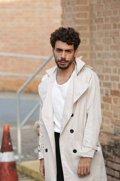 istock Transforming Male Photographic Model Styles into Dynamic Poses and Trend-Setting Outfits. 2183454125