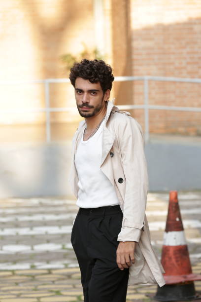 istock Transforming Male Photographic Model Styles into Dynamic Poses and Trend-Setting Outfits. 2183454129
