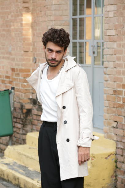 istock Transforming Male Photographic Model Styles into Dynamic Poses and Trend-Setting Outfits. 2183454158