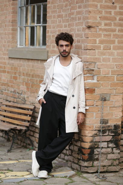 istock Transforming Male Photographic Model Styles into Dynamic Poses and Trend-Setting Outfits. 2183454218
