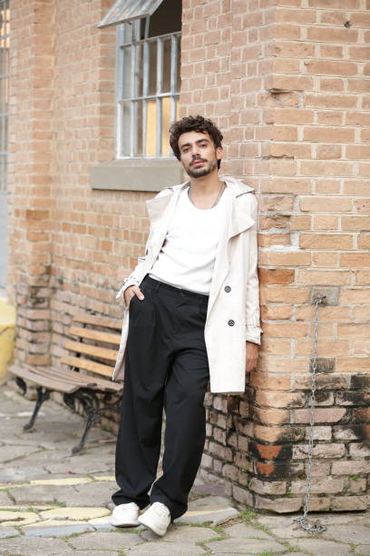 istock Transforming Male Photographic Model Styles into Dynamic Poses and Trend-Setting Outfits. 2183454392