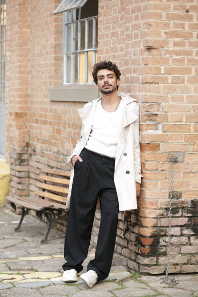 istock Transforming Male Photographic Model Styles into Dynamic Poses and Trend-Setting Outfits. 2183454449